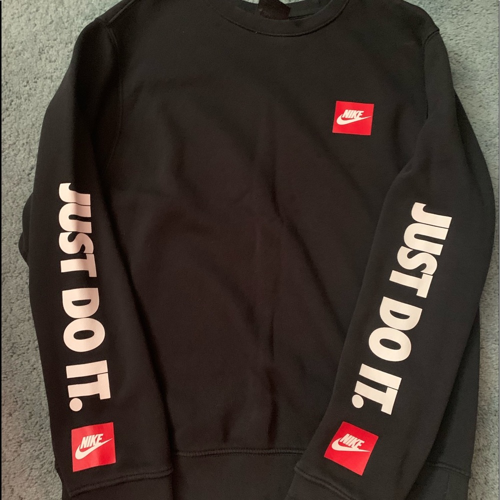 Small Nike Sweatshirt. Black. No rips or tears, comes from a smoke free home